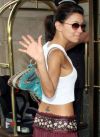 eva longoria small cross tattoo